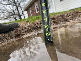 The driveway was sinking and causing major puddles to form during rainfall.