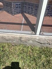 Cracks along the pool deck foundation walls were an obvious warning sign to the homeowner that settlement issues may be affecting the structure.