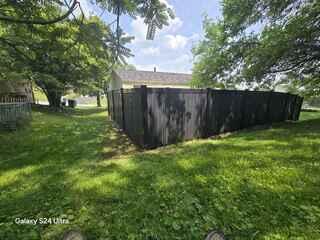 6' Privacy Black Fence Vinyl Fence / Black 36" Aluminum Railing.