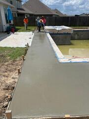 Smoothing out Freshly Poured Pool Deck!