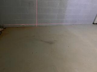 Identifying the Problem: Interior Slab Cracks and Settlement