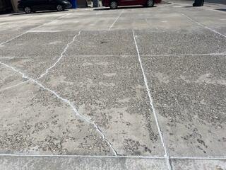 After concrete driveway repair job is finished