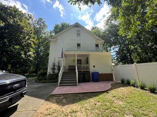 Side of home after gutter installation