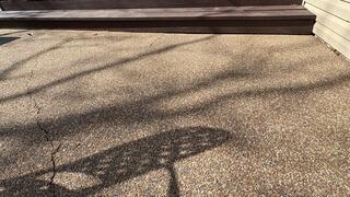 The patio is showing significant sinking. If unattended, the concrete will continue to worsen.