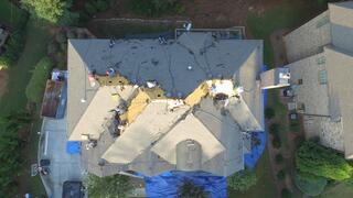 Shingle removal underway
