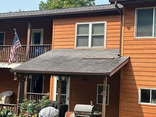 Lifted shingles nailed down