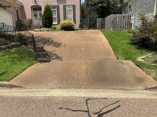 Water and erosion has taken atoll on this driveway.