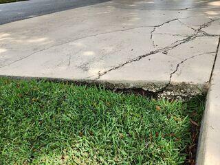 Soil Erosion Beneath Driveway