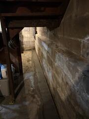 WaterGuard is a specially engineered interior drainage system designed to keep basements dry. Installed along the perimeter of the basement floor, it captures water from walls and the floor joint before it can enter your living space. Unlike traditional drains, WaterGuard sits above the footing to avoid clogs from dirt and debris, ensuring long-term, reliable protection against leaks and flooding.