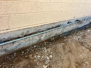 Rebar replaced, then rust inhibitor - stem wall foundation