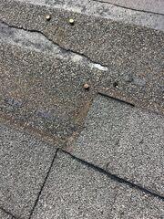 Storm damaged shingles