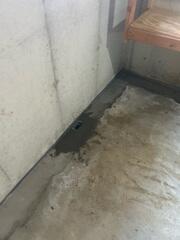 Pipes are laid along the interior perimeter and collect water seepage.