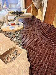 Drainage Matting is a specially designed underfloor drainage system that helps direct water safely toward your sump pump. Installed beneath your basement floor, it creates a channel for moisture to flow away from your foundation, preventing water buildup and reducing hydrostatic pressure. This effective, low-profile solution works seamlessly with other waterproofing systems to keep your basement dry and protected.
