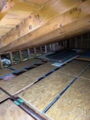 This homeowner only had some rolled insulation on the floor, which was not providing enough R-Value to insulate the home.