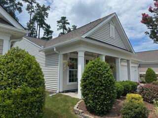 Side of home after Gutter Shutter installation