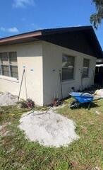 Stabilizing Foundation with Helical Piers