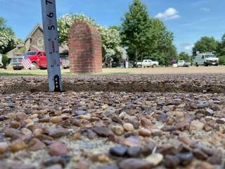 Soil erosion causing this driveway to sink.