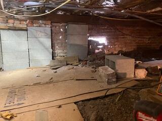 Inside The Crawl Space Of A Foundation Falling Apart