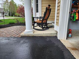 The weight of the home's structure, particularly the front pillars, exerted sustained pressure on the underlying soil, leading to differential settlement. Over time, this caused the front stoop to sink and become misaligned, compromising both safety and curb appeal.