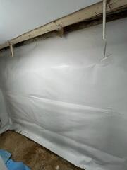 CleanSpace was installed on the walls to keep the moisture and humidity from the walls from filtering into the basement and weakening the supports and creating an unstable environment.