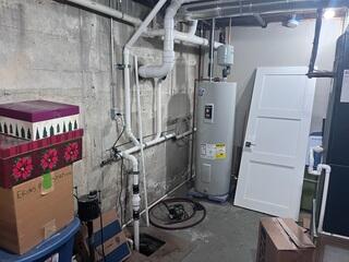 Installed a new lateral line and new TripleSafe™ Sump Pump to redirect water from the house, even during a power outage.