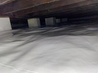 The CleanSpace™ vapor barrier keeps water out and your crawlspace clean.