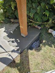 Helical piers installed, with concrete replaced.