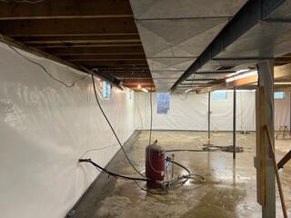 You can see where we installed an egress window along the back wall from this picture.