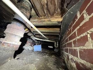 This Jacksonville crawl space showed clear signs of deterioration before repairs. The dirt floor, exposed utilities, and visible wood damage created an environment where moisture could easily enter, leading to mold growth, wood rot, and poor air quality throughout the home. Without protection, these conditions threaten both the structural integrity of the house and the health of those living inside.