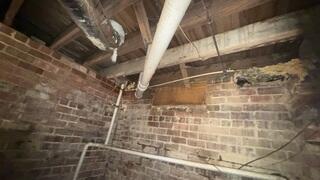 This foundation needed support. A bowing foundation wall is at risk of buckling. We fixed this wall before that could happen.