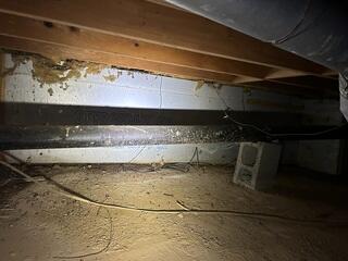 This crawl space was muddy from constantly being wet. It was becoming a huge point of concern for the homeowner and needed to be addressed.