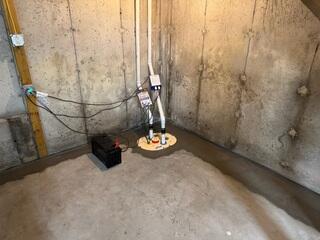 TripleSafe Sump Pump Cemented into Foundation