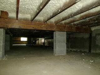 This crawl space had water and moisture issues and needed a permanent solution.