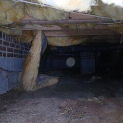 This High Point, NC crawl space shows common signs of moisture damage fallen insulation, exposed dirt floors, and humidity buildup. These conditions can lead to mold growth, pest activity, and poor indoor air quality if left untreated. Many homeowners don't realize that issues in the crawl space affect the comfort and health of the entire home.