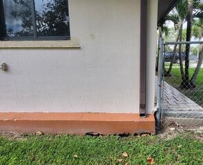 The homeowner noticed areas beneath their home's foundation where it appeared that the underlying soil had eroded, leaving large voids and a lack of stable support.