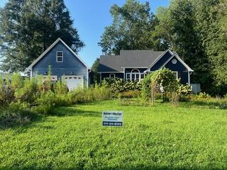 Front of home after Gutter Shutter installation
