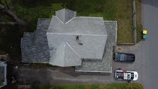Here you can see the roof before we got started. Shingles were breaking down, nails were popping, and the overall look showed years of wear. It was definitely time for a replacement.