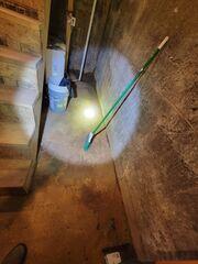 In this photo, you can see where water has intruded before; there are water spots on the floor that have dried out.