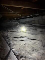 The LRE Design Specialist's inspection of the crawl space revealed elevated levels of humidity and moisture.
