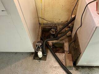 The previously installed sump pump system failed to adequately capture and discharge incoming water, particularly during periods of heavy rainfall and snowmelt. This deficiency led to repeated basement leaks and flooding, resulting in damage to stored items such as furniture and tools. The lack of reliable water management underscored the need for a more robust and high-capacity sump pump solution to protect the space from future water intrusion.
