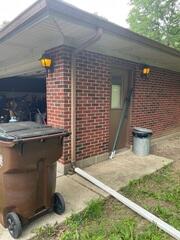 This corner of the garage was where the foundation was sinking. You can see the refrigerator the homeowner put over the door frame inside of the garage through the window to alert guests that the door was inaccessible.