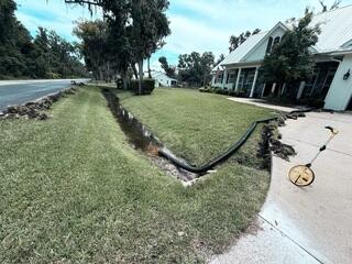 Downspout Drainage Extension and Discharge Line Installation in Elkton, FL