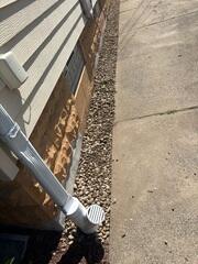 Exterior Drainage Line and Downspout Extension Installed at Dearborn, MI Home