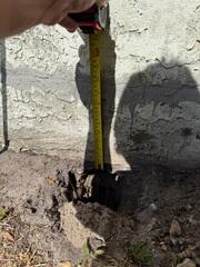 During the inspection of the home's foundation by the LRE Design Specialist, it was discovered that the underlying soil had settled, creating instability for the home.