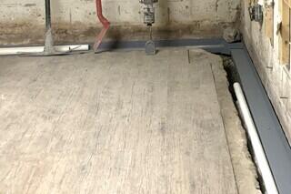 The first step to installing the WaterGuard System is to remove part of the concrete slab. Minimal invasion is required and once the WaterGuard is in place, everything gets restored.