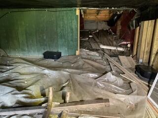 The existing vapor barrier within the crawl space was deteriorated and no longer functioning effectively, allowing ground moisture to infiltrate the area. This compromised condition created an environment conducive to mold growth, wood rot, and elevated humidity levels, which could lead to musty odors permeating into the living space above. A properly installed and sealed vapor barrier is essential for controlling moisture, preserving structural integrity, and maintaining healthy indoor air quality.
