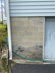 Stair-step cracking in masonry walls is a clear indicator of differential foundation settlement. This type of structural distress signifies compromised foundation integrity and, if left unaddressed, may lead to progressive deterioration and potential wall collapse. Timely intervention to stabilize the foundation is critical, as delays can exacerbate the damage, increase safety risks, and result in substantially higher repair costs.