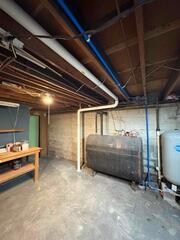 Stamford, CT - High-Level Radon Mitigation for 1964 Cape