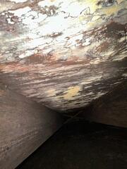 Due to high humidity, the subfloor has weakened over time but now it is extremely dangerous. The homeowner is in extreme danger of falling through the floor.