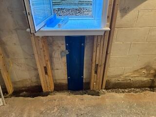 WellDuct was installed under the window to guide any leakage to the sump pump for removal.